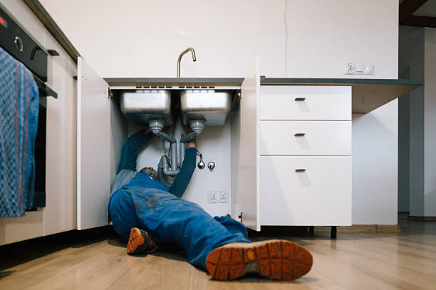 Professional Plumbing technician working in Fairwater, WI